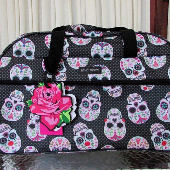 Betsey Johnson Handbags - BETSEY JOHNSON SKULL PARTY 22" ROLLING DUFFLE NEW!